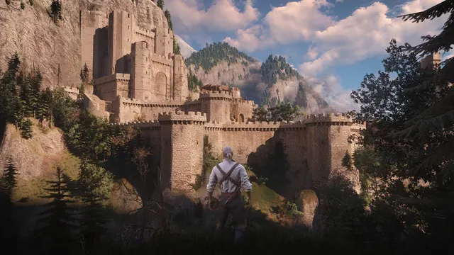 Geralt approaches a stone fortress surrounded by mountains